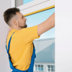 Should Window Blinds Go Inside or Outside Window Frame – Person Measuring Window